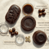 Collection of organic coffee soap in different shapes with coffee beans and extracts.
