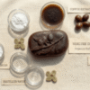 Oval organic coffee soap with leaf imprint and natural coffee bean ingredients.