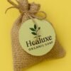 Niacinamide Soap in burlap drawstring bag with Healuxe Organics logo tag